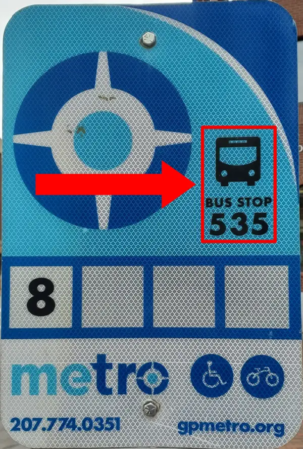 A bus stop sign with the stop number highlighted